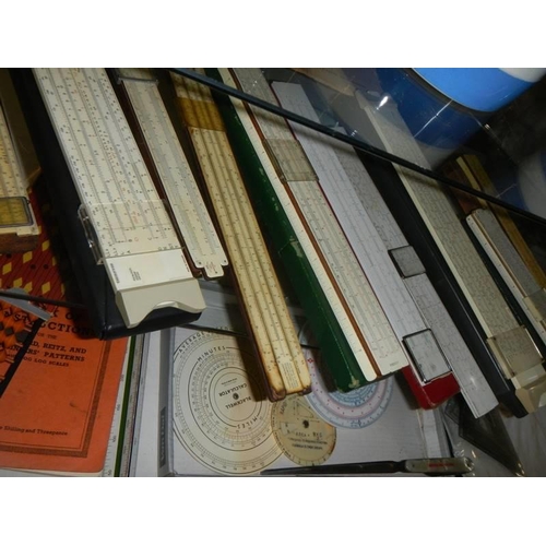 395 - A mixed lot of various slide rules including circular types.