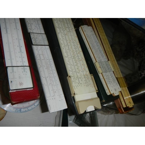 395 - A mixed lot of various slide rules including circular types.