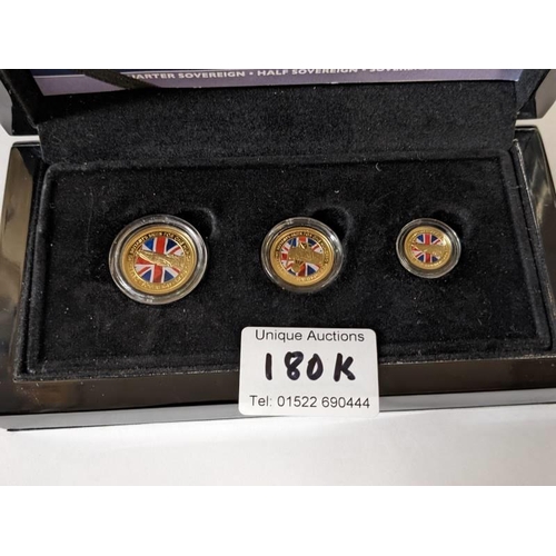 180K - A cased The 2018 Defence of our Skies colour sovereign gold series containing quarter sovereign, hal... 