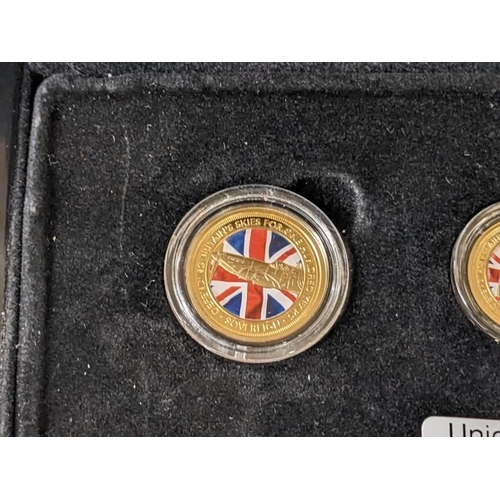 180K - A cased The 2018 Defence of our Skies colour sovereign gold series containing quarter sovereign, hal... 