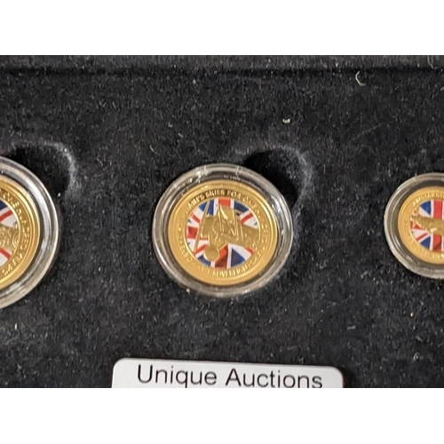 180K - A cased The 2018 Defence of our Skies colour sovereign gold series containing quarter sovereign, hal... 