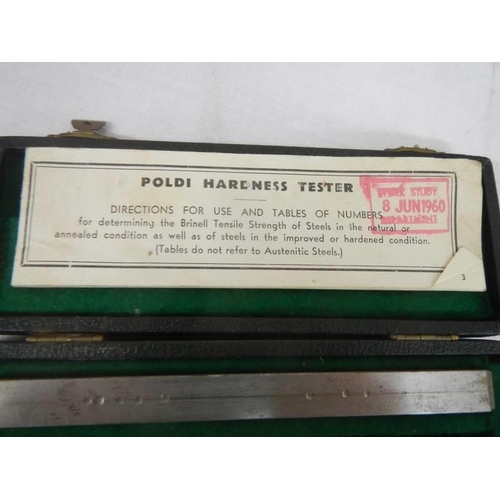 433 - A cased Poldi hardness tester.