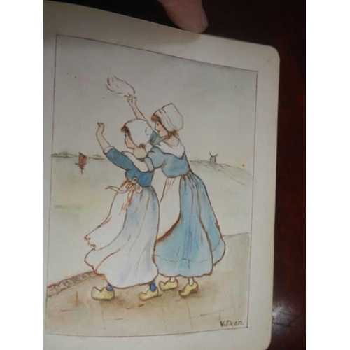 449 - An early 20th century autograph book containing verses and drawings.