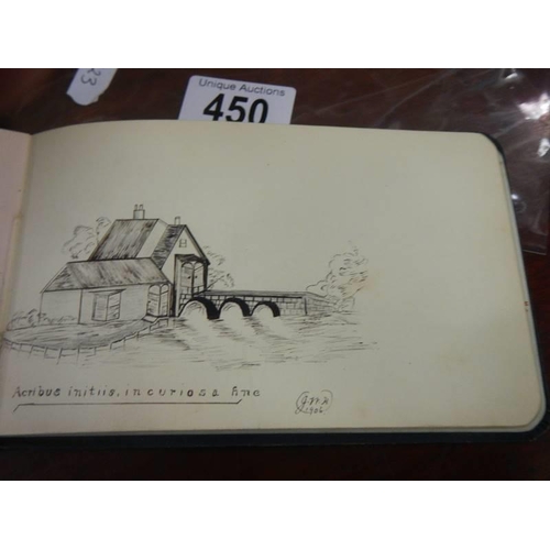 450 - An early 20th century autograph book containing verses and drawings.