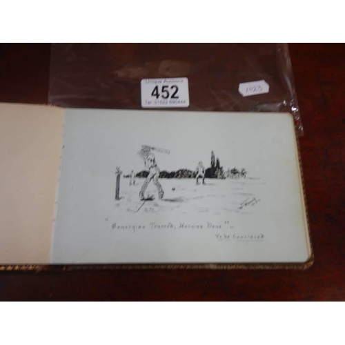 452 - An early 20th century autograph book containing verses and drawings.