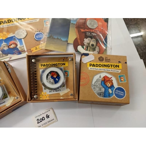 200M - Two boxed Paddington 2019 silver proof coins 'At the Tower' and 'At St. Paul's' 2 sealed Paddington ... 