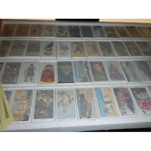 458 - Approximately 100 sets of replica cigarette cards with certificates.