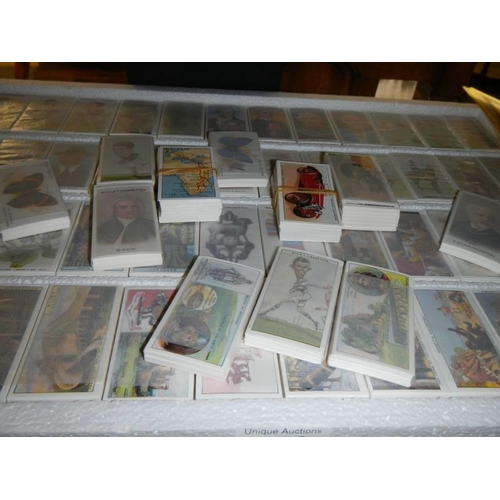 458 - Approximately 100 sets of replica cigarette cards with certificates.