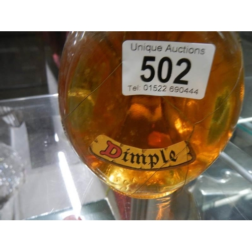 502 - A bottle of Dimple Whisky won in a raffle 60 years ago.