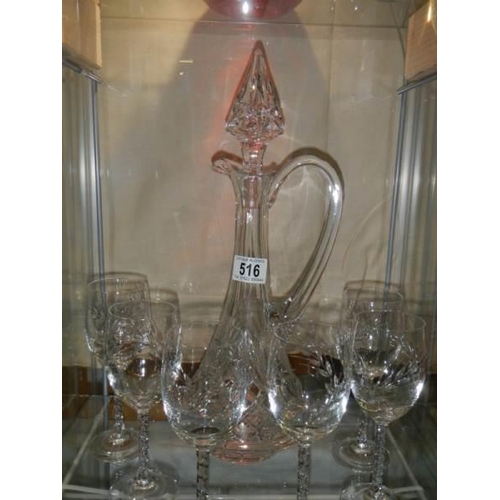 516 - A good cut glass claret jug and six glasses.