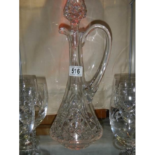 516 - A good cut glass claret jug and six glasses.