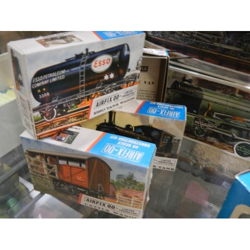 551 - A quantity of boxed Airfix trains.