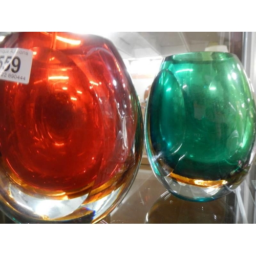 559 - Three heavy glass retro style vases.