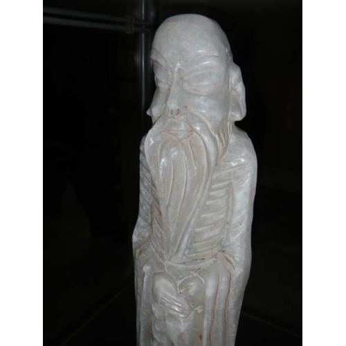 562 - A large Alabaster Chinese figure.