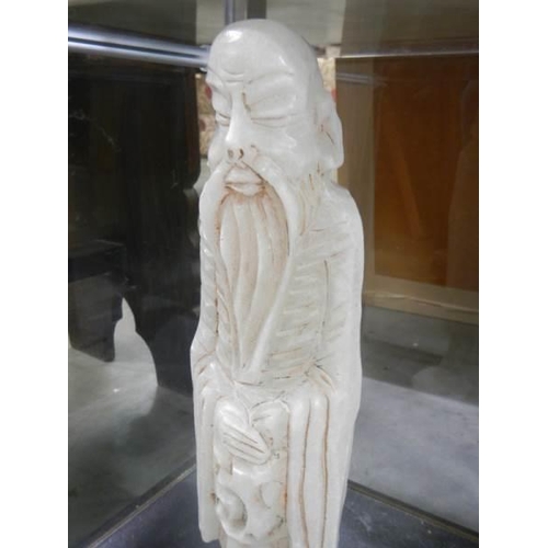 562 - A large Alabaster Chinese figure.