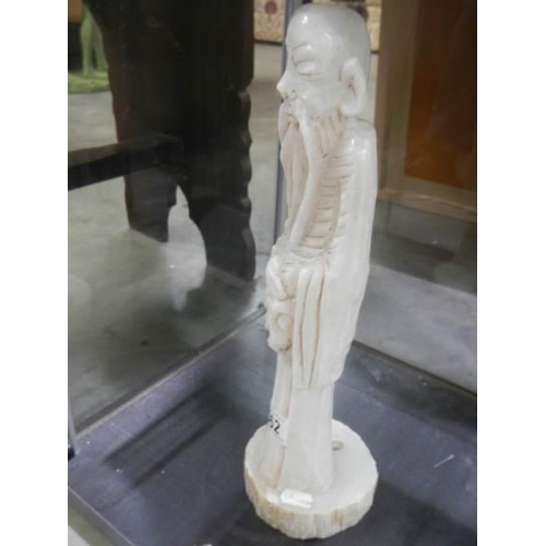 562 - A large Alabaster Chinese figure.