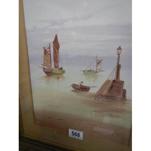 568 - A framed and glazed watercolour seascape initialed U M.  45 x 58 cm.