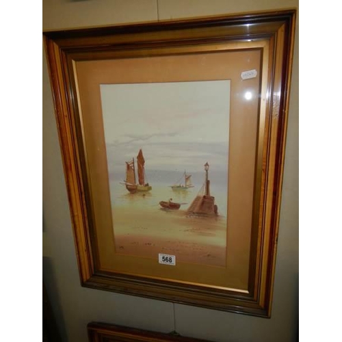 568 - A framed and glazed watercolour seascape initialed U M.  45 x 58 cm.