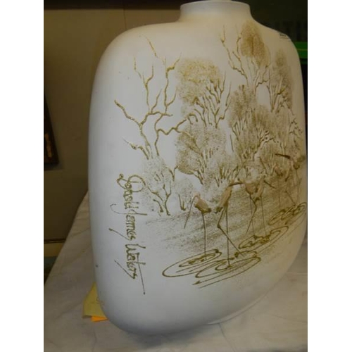 595 - An unusual oval shaped signed vase, 40 cm tall.