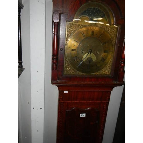 654 - A good eight day long case clock with brass arched dial