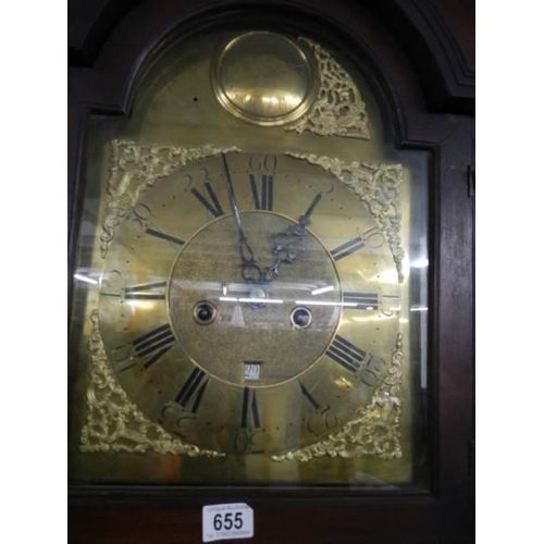 655 - A good eight day long case clock with brass arched dial