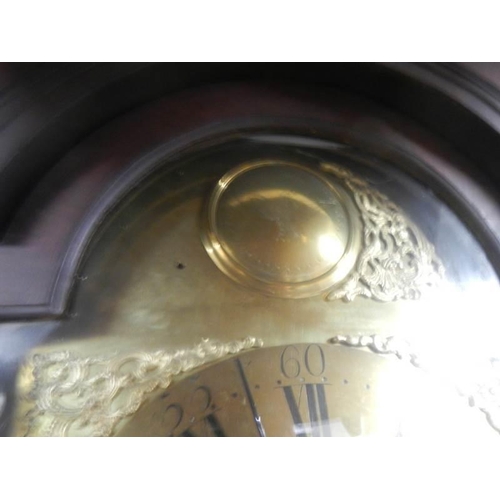 655 - A good eight day long case clock with brass arched dial