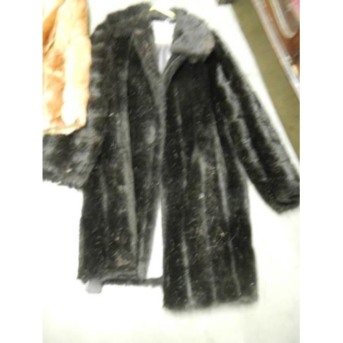 656 - Three vintage fur jackets.