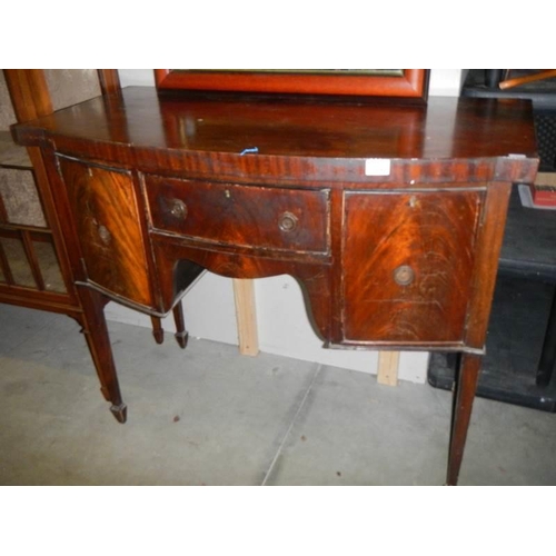 662 - A small Victorian mahogany bow front sideboard.