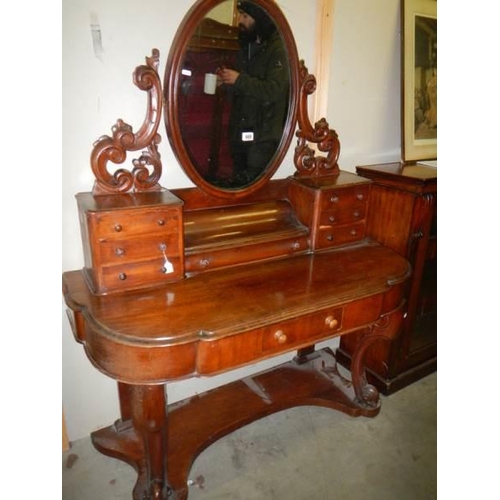 669 - A Victorian mahogany Duchy dressing table.