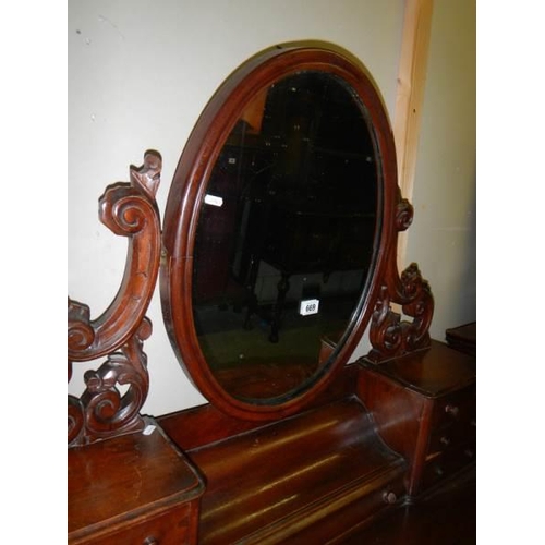 669 - A Victorian mahogany Duchy dressing table.