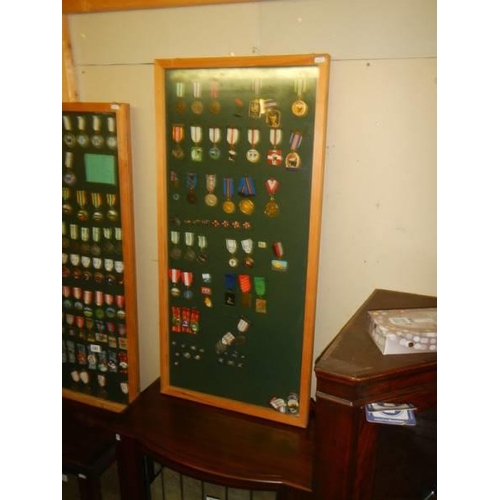 681 - Three framed and glazed cases of various medals. COLLECT ONLY.