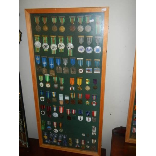 681 - Three framed and glazed cases of various medals. COLLECT ONLY.