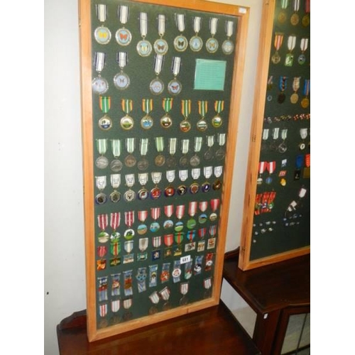 681 - Three framed and glazed cases of various medals. COLLECT ONLY.