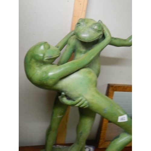 683 - A large heavy verdigris bronze garden statue of frogs dancing. Height 104cm. COLLECT ONLY.