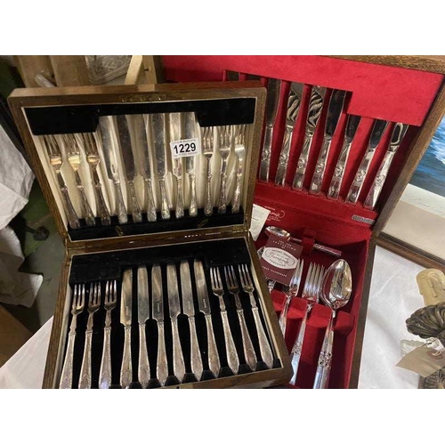 1229 - A 49 piece cased cutlery set (missing 1 cake fork) and a 24 piece cased fish knife and fork set