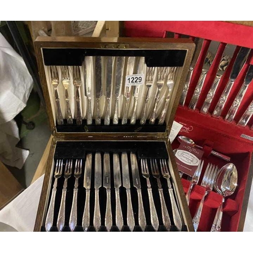 1229 - A 49 piece cased cutlery set (missing 1 cake fork) and a 24 piece cased fish knife and fork set