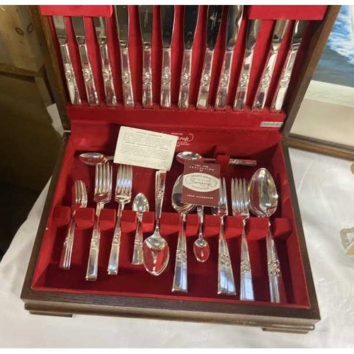 1229 - A 49 piece cased cutlery set (missing 1 cake fork) and a 24 piece cased fish knife and fork set