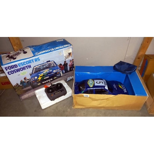 1306 - A boxed T2M Ford Escort RS Cosworth team Yacco. 1/10 scale gas powered radio control car