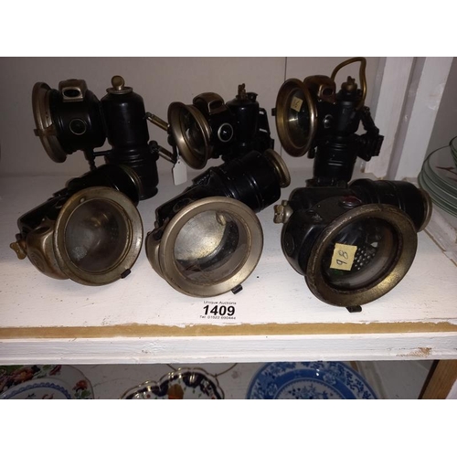 1409 - 6 early 20th century motorcycle carbide lamps