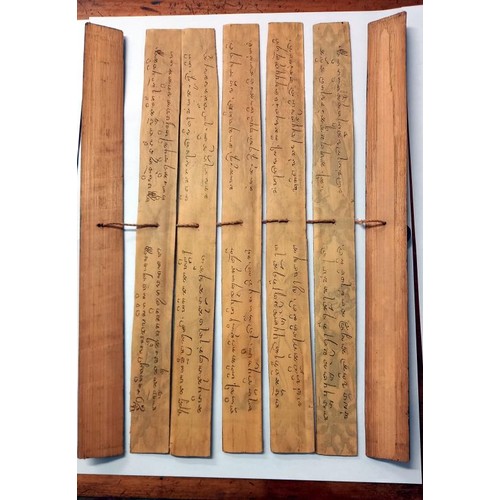 250 - Three antique Tibetan Buddist palm leaf manuscripts.