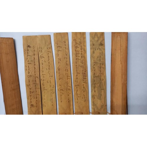 250 - Three antique Tibetan Buddist palm leaf manuscripts.