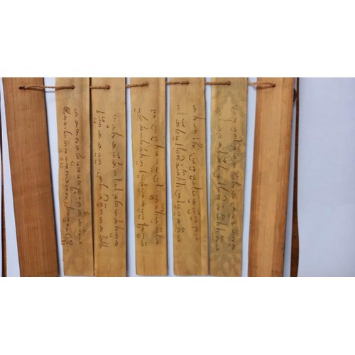 250 - Three antique Tibetan Buddist palm leaf manuscripts.