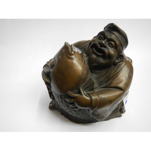 200V - A bronze laughing Buddha.