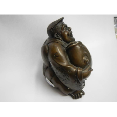 200V - A bronze laughing Buddha.