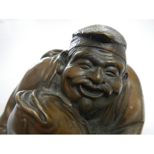 200V - A bronze laughing Buddha.