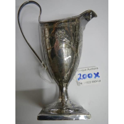 200X - A Georgian hall marked silver jug.