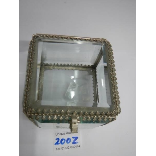 200Z - A French style bevelled glass and gilt trinket box.