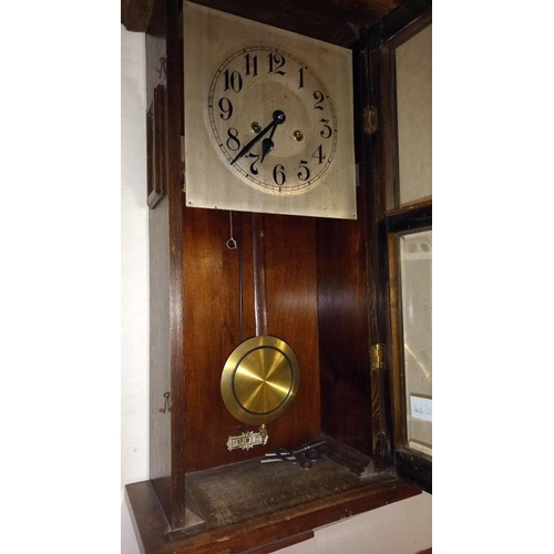 1633 - A 1930's oak wall clock. COLLECT ONLY.