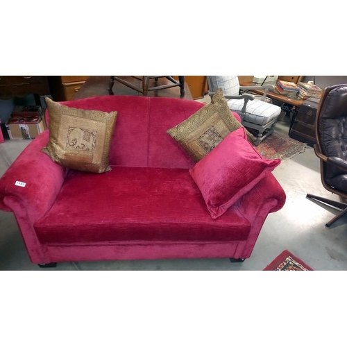 1642 - A deep red Draylon Chesterfield sofa with cushions COLLECT ONLY.