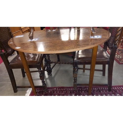 1644 - A 1970's round drop leaf Formica kitchen table COLLECT ONLY.